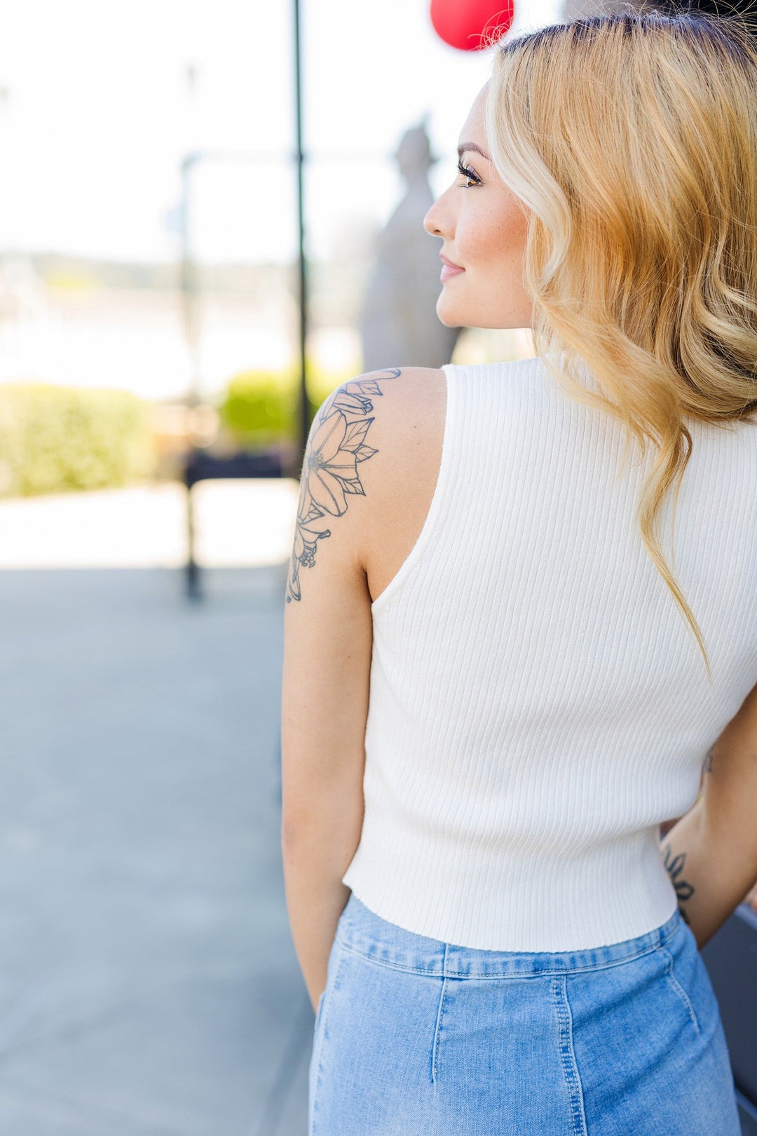 The Bad to the Bow Sleeveless Sweater