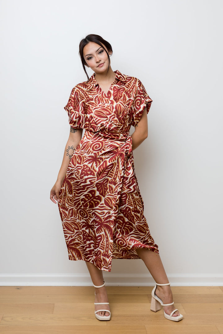 The Taking Chances Rust Palm Satin Wrap Dress