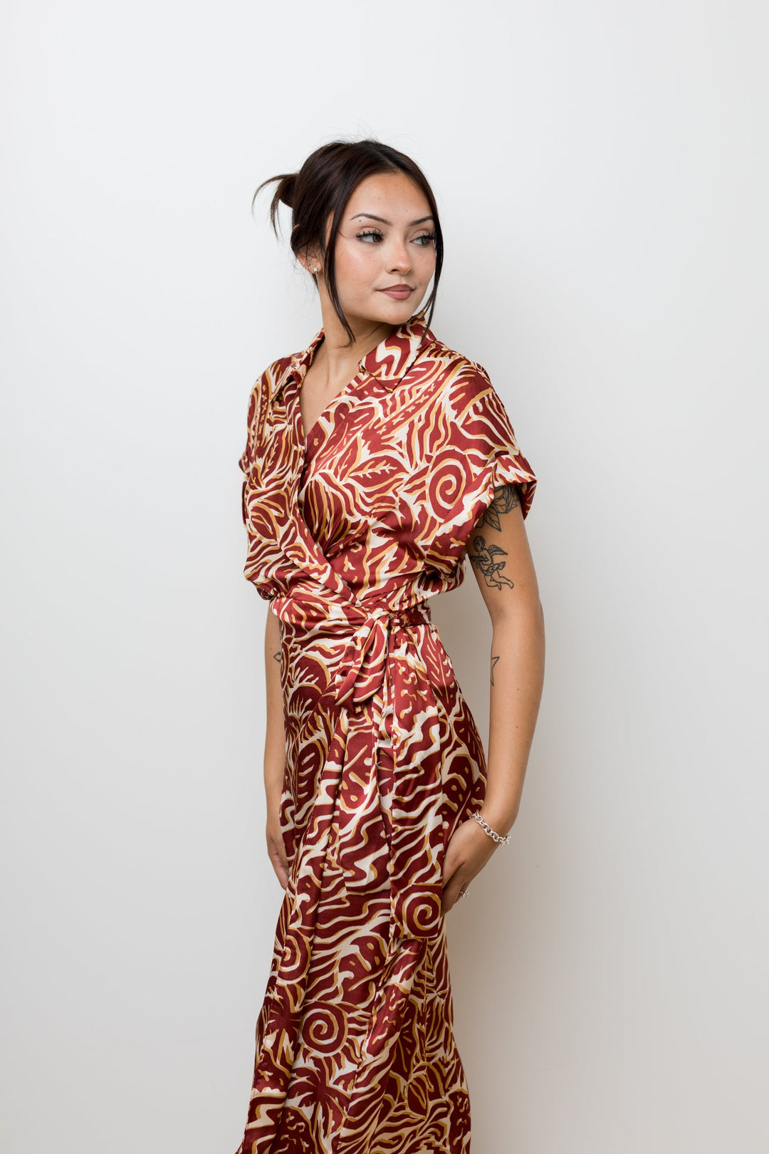 The Taking Chances Rust Palm Satin Wrap Dress