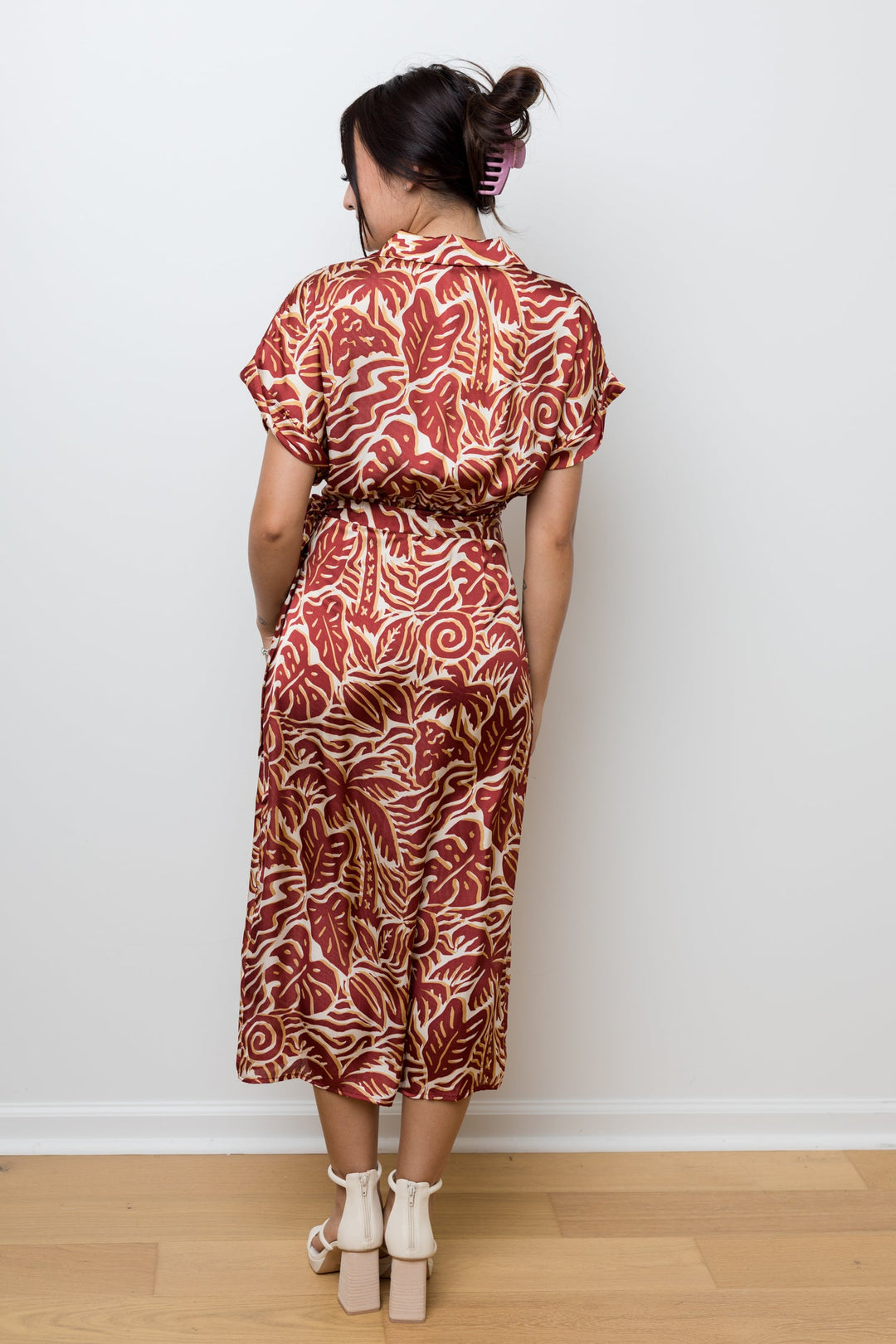 The Taking Chances Rust Palm Satin Wrap Dress